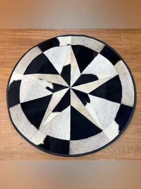 Black & White Star Patchwork Cowhide Round Rug - Home Accents